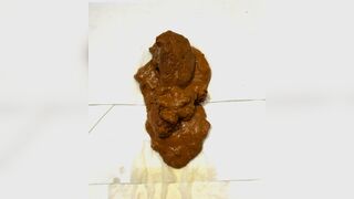 Taking a sloppy shit.