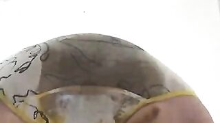 Poop pants in a chair