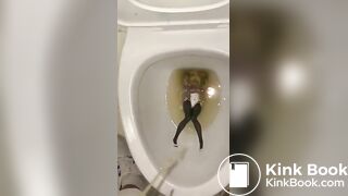 piss anime figure in public toilet