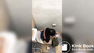 Thai womam pooping in toilet