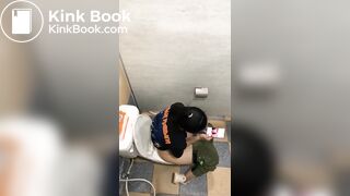 Thai womam pooping in toilet