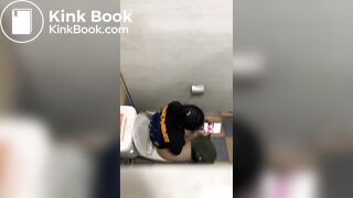 Thai womam pooping in toilet