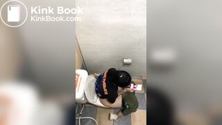 Thai womam pooping in toilet
