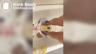 Slave daddy pees over his dirty diaper