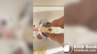 Slave daddy pees over his dirty diaper