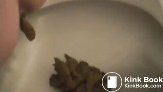 Girl pooping on toilet self shot 14