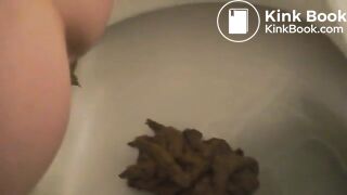 Girl pooping on toilet self shot 14