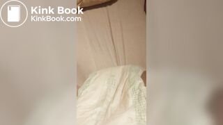 Babygirl loading her nappy