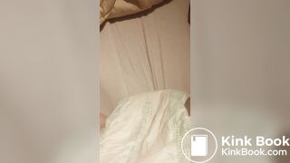 Babygirl loading her nappy