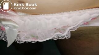 A lovely pink flower pattern panty cover on top.A white one was inside!