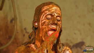 Betty licks the cowshit covered dildo