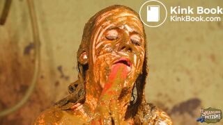 Betty licks the cowshit covered dildo