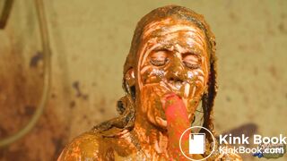 Betty licks the cowshit covered dildo