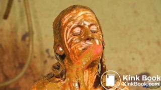 Betty licks the cowshit covered dildo