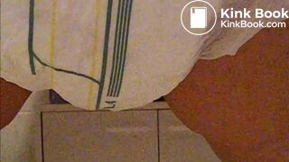 Girl poops diaper and plays