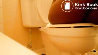 Ebony Girl pooping in toilet