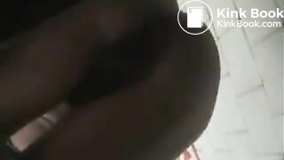 Girl in green bikini takes a dump in a public toilet.