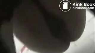 Girl in green bikini takes a dump in a public toilet.