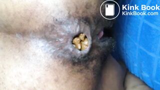 Black hairy pussy letting out fat monster turd