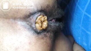 Black hairy pussy letting out fat monster turd
