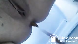 Girl shits in toilet