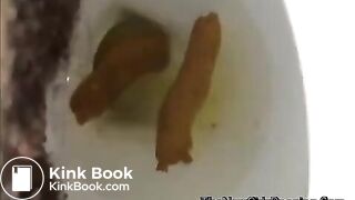 close view of an ebony shitting