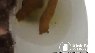 close view of an ebony shitting