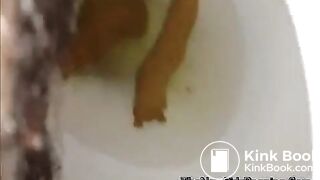 close view of an ebony shitting