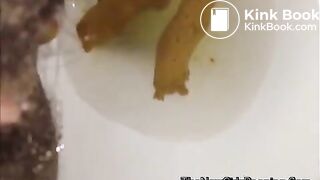 close view of an ebony shitting