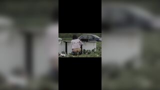 woman shit in the middle of the road