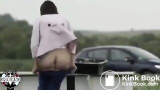 woman shit in the middle of the road
