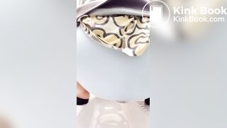 Shitting in panty in public toilet