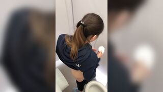 cute asian girl pooping in the toilet