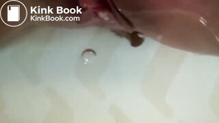 Girl shits huge turd in bathtub