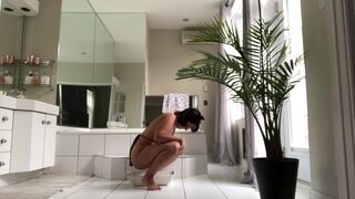 Cute Girl Shitting to Cat Litter