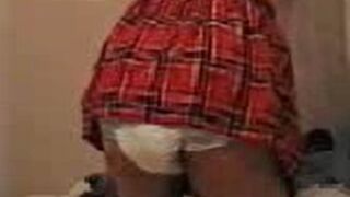 Girl Pooping in Disposable Diaper