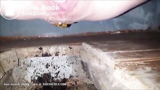 girl is pooping on outdoor toilet