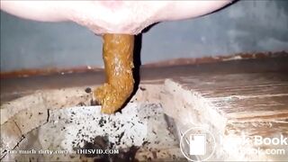 girl is pooping on outdoor toilet