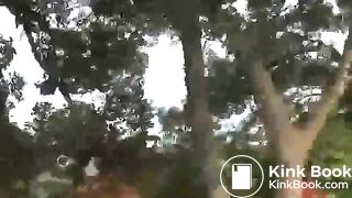 Asian girl pooping in a park