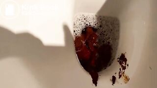 Blonde drops very fat turd in the toilet