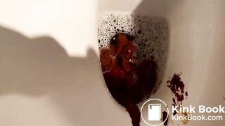 Blonde drops very fat turd in the toilet