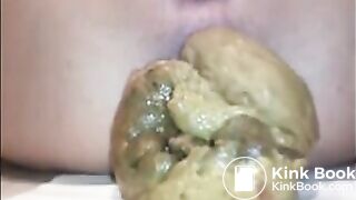 Woman shit a very big load closeup