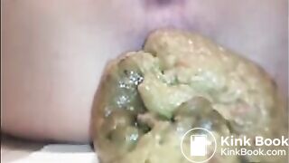 Woman shit a very big load closeup