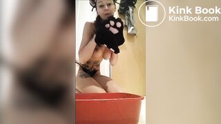 Here she pretends to be a cat and shits in the litter tray.