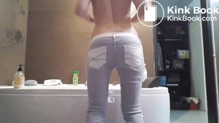 Pooping in White Denim before spreading buttocks