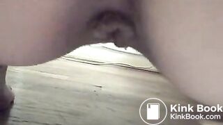 Sexy lady squats and shits on a plate