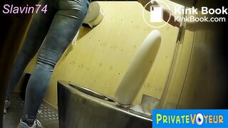 Woman pooping at public toilet at 1.55