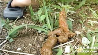 Woman Shitting in Grass