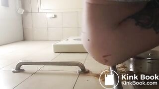 Public toilet scat wall