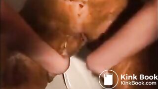 Woman smearing shit on her body